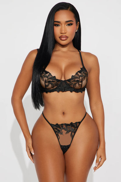 Woman in black lingerie and fur coat standing in a desert landscape, Play Nice- Embroidered 3 Piece Set- Black.
Mi Amore House of Styles, Explore Mi Amore’s exquisite lingerie sets. Perfect for every occasion, combining delicate lace and comfort. Shop in Trinidad and Tobago.
Mi Amore House of Styles