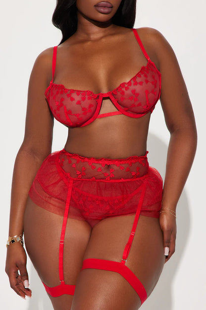 Wild Dreams- 5 Piece Garter Set- Red. Elevate your allure with Mi Amore’s sophisticated garter sets. Perfectly crafted for style and elegance in Trinidad and Tobago. Mi Amore House of Styles