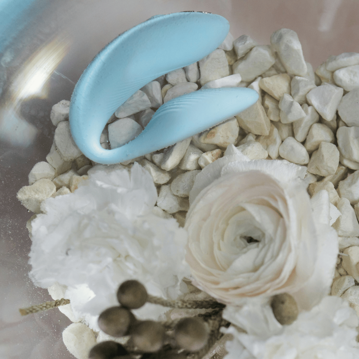 Pleasuremas 2025 collection featuring luxury adult toys, candles, and intimate gift sets from Belle Exotics.