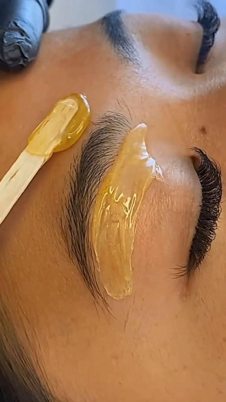 Professional facial waxing services at IsleAura Spa & Wellness Center